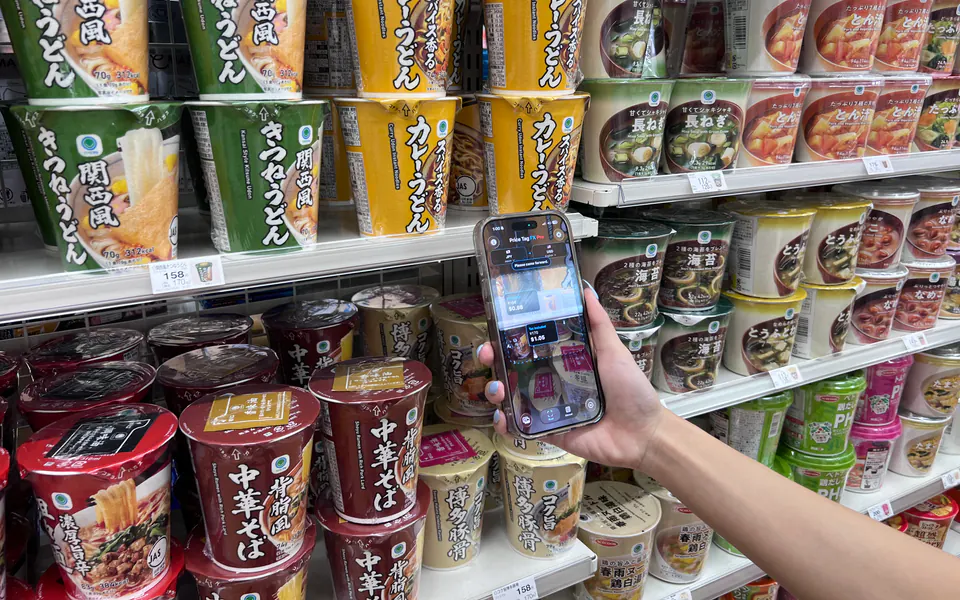 Price Tag FX being used with an iPhone in a Japanese shop aisle